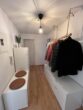 VERKAUFT - Gepflegte Souterrain-Wohnung in ruhiger Lage - für den Käufer provisionsfrei - Eingangsflur mit Garderobe