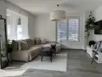 Wohnzimmer - VERKAUFT - Neuwertige, attraktive und altersgerechte 2-Zi.-ETW mit Gartenanteil und Garage