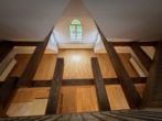 Gepflegte Maisonettewohnung im "Loft-Style" mit Ausblick und Dachloggia - Blick von oben aus der Galerie in das Wohn- und Esszimmer